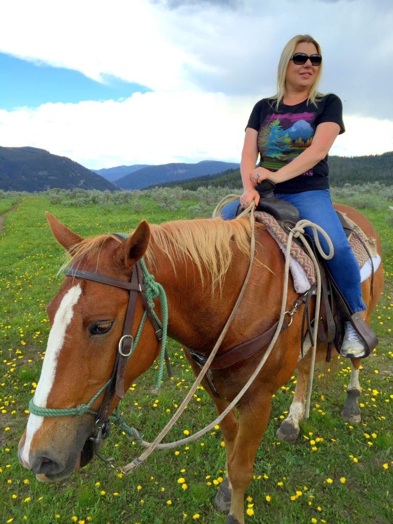Susan Polgar horseback riding
